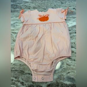 Charming Peach Bodysuit with Pumpkin Accent
